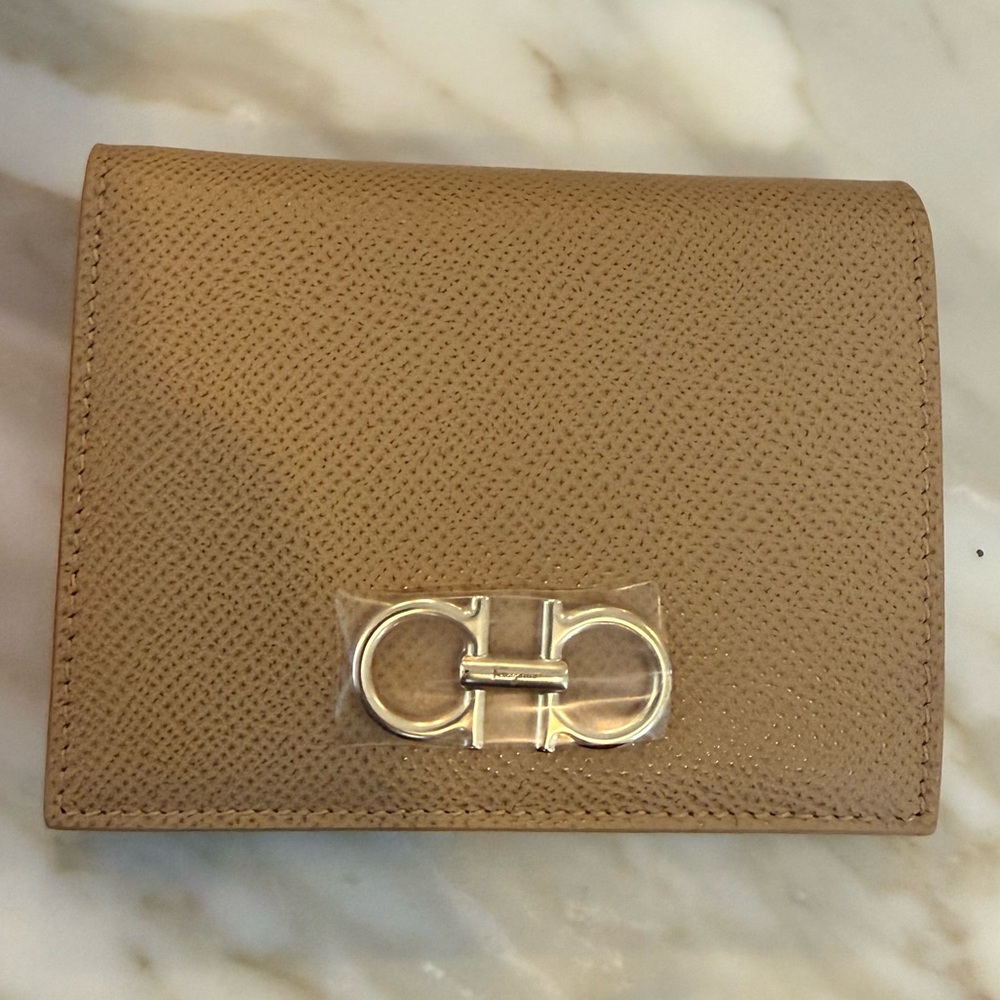Brand new in box Ferragamo wallet.